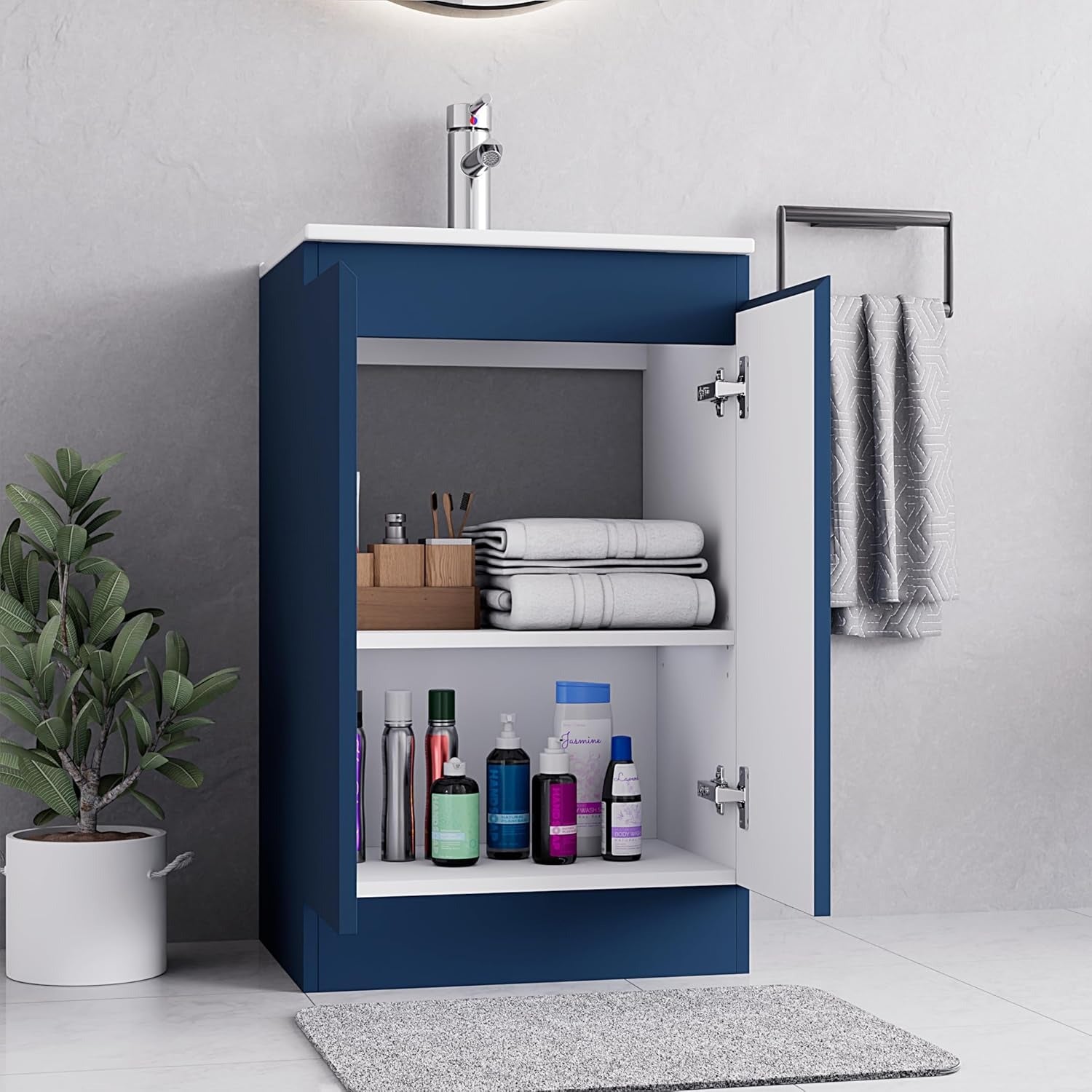 500mm dark blue vanity unit with open cabinet door showing internal storage shelves and towels
