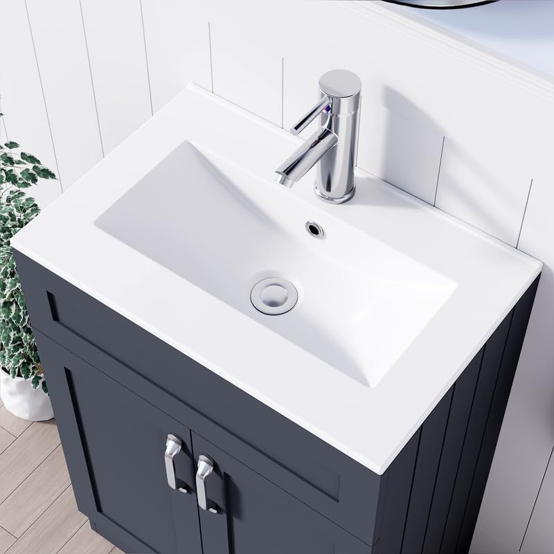 Close-up of white integrated sink with chrome faucet on 500mm dark grey vanity unit