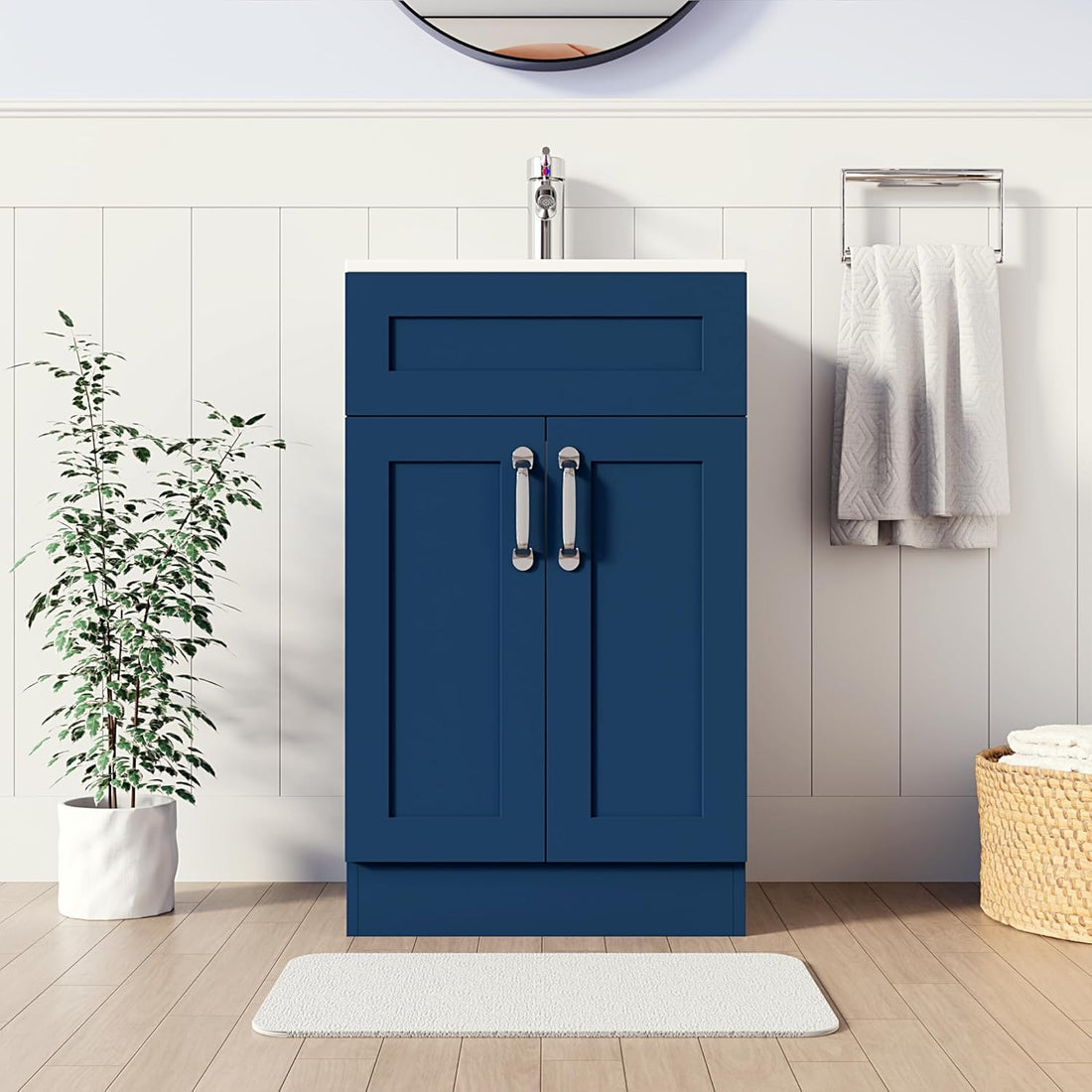500mm navy blue vanity unit with white sink and chrome handles in modern bathroom