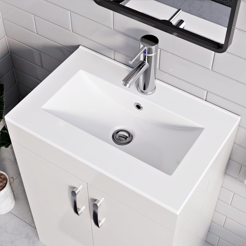 Close-up of white integrated sink with chrome faucet on 500mm new york white vanity unit