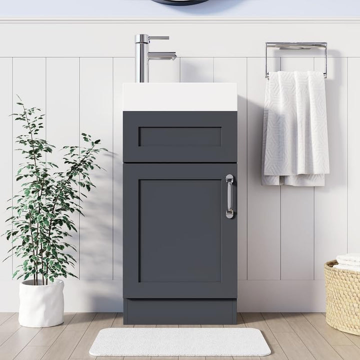 Light grey 400mm bathroom vanity unit with drawer and cabinet storage in white tiled bathroom