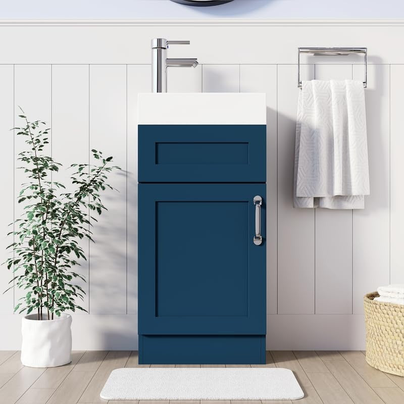 Navy blue 400mm bathroom vanity unit with drawer and cabinet storage in white tiled bathroom