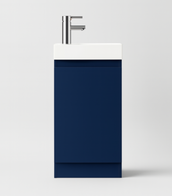 Blue vanity unit with white countertop and silver faucet on a light gray background