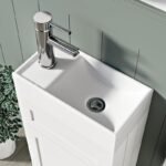 Close-up of 400mm matt white vanity with white rectangular sink and chrome single-lever faucet