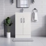 500mm new york white vanity unit with double cabinet doors in white tiled bathroom